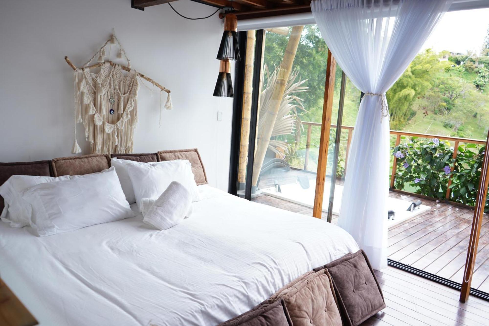 Ibuku Hotel Guatape - Chalets エクステリア 写真